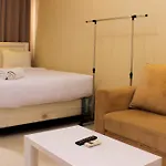 Comfort Studio Room At Oasis Cikarang Apartment By Travelio